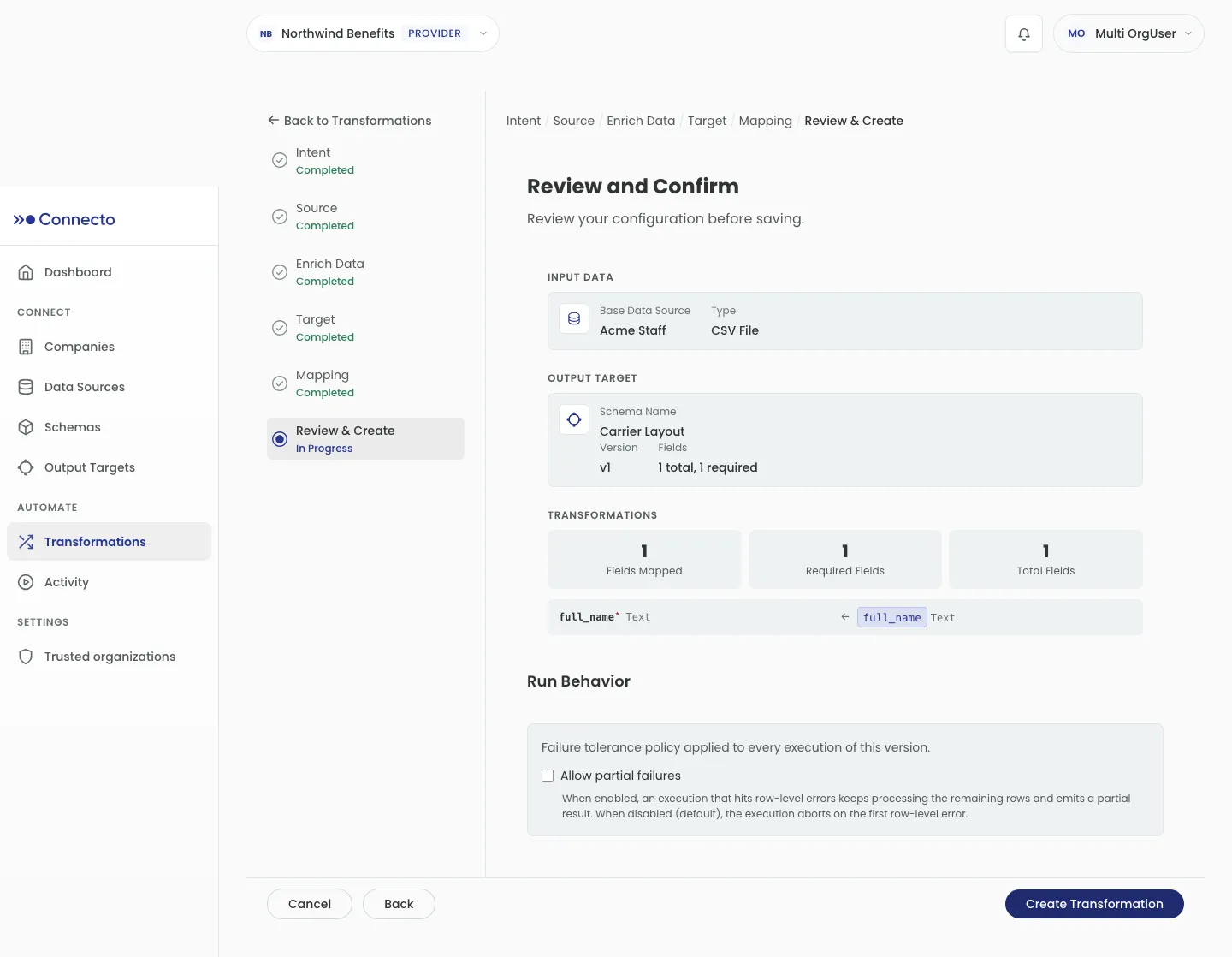 The Review &amp; Create step showing Input Data, Output Target, and Transformations summaries, the Run Behavior “Allow partial failures” toggle, and the Create Transformation button